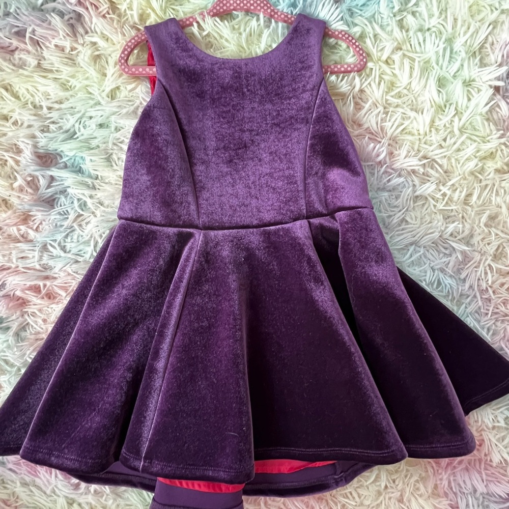 Purple velvet dress with hot pink underlining. Never worn. Size 3T. Genuine Kids